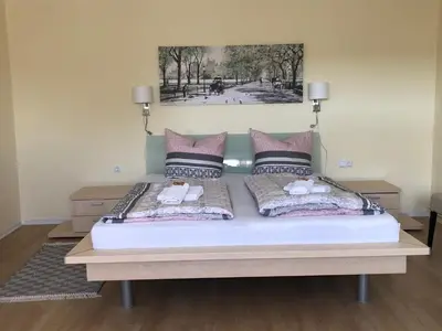 Ein Bett oder Betten in einem Zimmer der Unterkunft Ferienwohnung in der Fahrradpension Joachimsthal