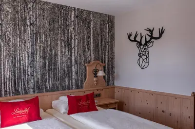 Ein Bett oder Betten in einem Zimmer der Unterkunft Landgasthof zum Mühlenteich