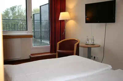 Ein Bett oder Betten in einem Zimmer der Unterkunft Bildungszentrum Erkner
