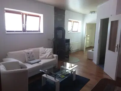Ein Sitzbereich in der Unterkunft Ferienhaus an den Moorwiesen