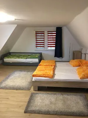 Ein Bett oder Betten in einem Zimmer der Unterkunft Ferienhaus am Beetzsee