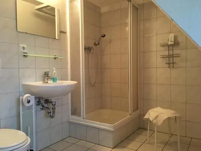Ein Badezimmer in der Unterkunft Ferienhaus am Beetzsee