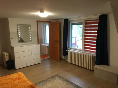 Ein Bett oder Betten in einem Zimmer der Unterkunft Ferienhaus am Beetzsee