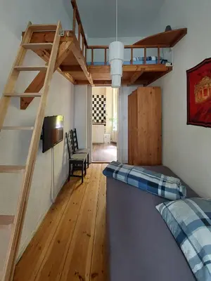 Ein Bett oder Betten in einem Zimmer der Unterkunft Ruhige Ferienwohnung in Kreuzberg