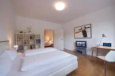 Ein Bett oder Betten in einem Zimmer der Unterkunft Art'Appart Suiten - kontaktloser Check-In