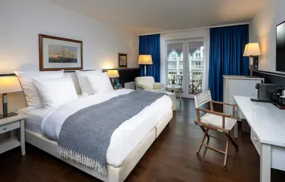 Ein Bett oder Betten in einem Zimmer der Unterkunft Sunday Resort Hafendorf Rheinsberg