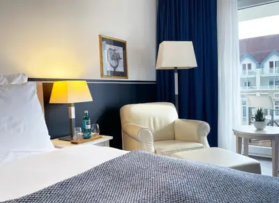 Ein Bett oder Betten in einem Zimmer der Unterkunft Sunday Resort Hafendorf Rheinsberg