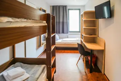 Ein Bett oder Betten in einem Zimmer der Unterkunft acama Hotel & Hostel Kreuzberg