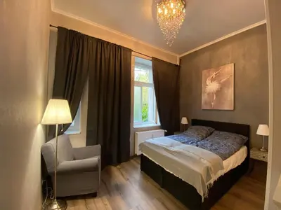 Ein Bett oder Betten in einem Zimmer der Unterkunft K&S Apartments