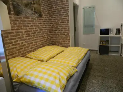 Ein Bett oder Betten in einem Zimmer der Unterkunft K&S Apartments