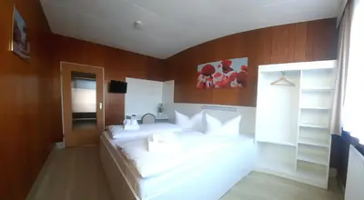 Ein Bett oder Betten in einem Zimmer der Unterkunft Central-Hotel Tegel