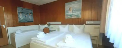 Ein Bett oder Betten in einem Zimmer der Unterkunft Central-Hotel Tegel