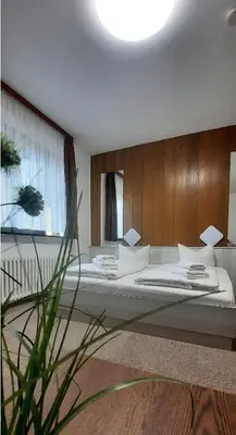 Ein Bett oder Betten in einem Zimmer der Unterkunft Central-Hotel Tegel