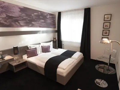 Ein Bett oder Betten in einem Zimmer der Unterkunft Good Morning Berlin City West