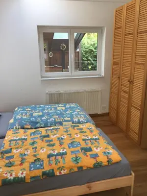 Ein Bett oder Betten in einem Zimmer der Unterkunft Ruhiges Ferienhaus Wandlitz