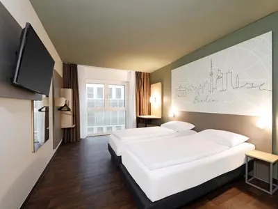 Ein Bett oder Betten in einem Zimmer der Unterkunft B&B HOTEL Berlin-Mitte