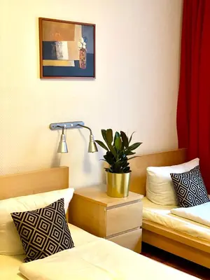 Ein Bett oder Betten in einem Zimmer der Unterkunft Hotel Arena Rooms - Berlin Mitte