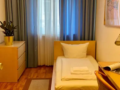 Ein Bett oder Betten in einem Zimmer der Unterkunft Hotel Arena Rooms - Berlin Mitte
