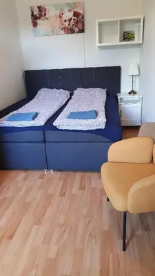 Ein Bett oder Betten in einem Zimmer der Unterkunft Ferienwohnung 2
