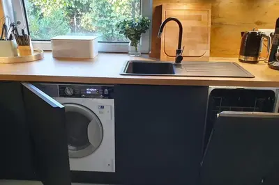 Küche/Küchenzeile in der Unterkunft charmantes Townhaus mit Garten, W-LAN & Netflix