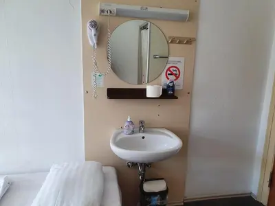 Ein Badezimmer in der Unterkunft Märkischer Hof Hotel