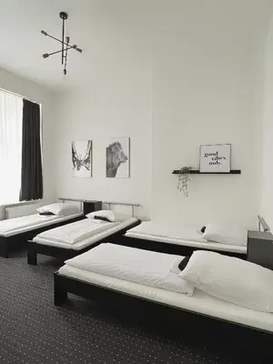 Ein Bett oder Betten in einem Zimmer der Unterkunft Hotel AVAlex