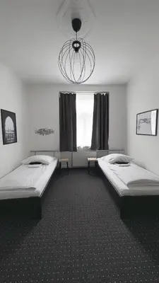 Ein Bett oder Betten in einem Zimmer der Unterkunft Hotel AVAlex