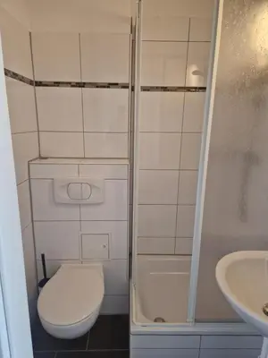 Ein Badezimmer in der Unterkunft Zimmervermietung Berlin Mertens