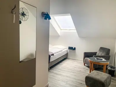 Ein Bett oder Betten in einem Zimmer der Unterkunft PRIMA Inn Unterkunft direkt über der 
