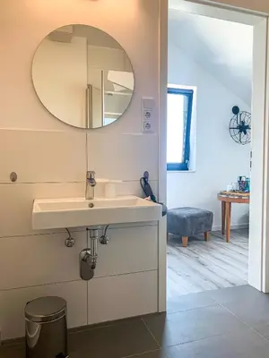 Ein Badezimmer in der Unterkunft PRIMA Inn Unterkunft direkt über der 