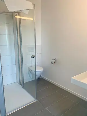Ein Badezimmer in der Unterkunft PRIMA Inn Unterkunft direkt über der 