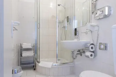 Ein Badezimmer in der Unterkunft Aparthotel VEGA