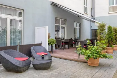 Ein Sitzbereich in der Unterkunft Citadines Kurfürstendamm Berlin