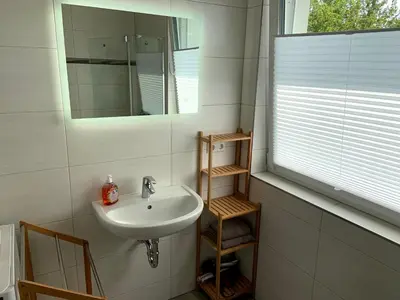 Ein Badezimmer in der Unterkunft Ferienwohnung im Stadtzentrum