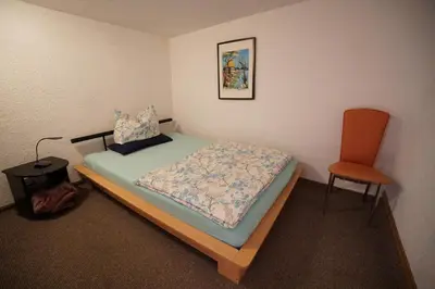 Ein Bett oder Betten in einem Zimmer der Unterkunft Pension Becker Luckenwalde