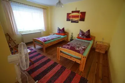 Ein Bett oder Betten in einem Zimmer der Unterkunft Pension Becker Luckenwalde