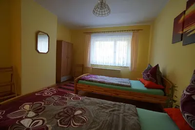 Ein Bett oder Betten in einem Zimmer der Unterkunft Pension Becker Luckenwalde