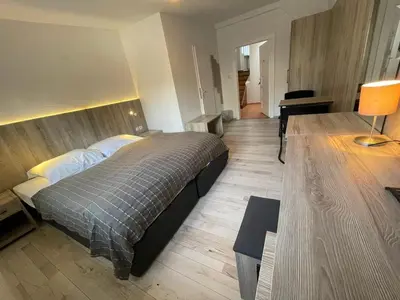 Ein Bett oder Betten in einem Zimmer der Unterkunft Pension Der Kretaner