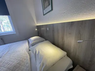Ein Bett oder Betten in einem Zimmer der Unterkunft Pension Der Kretaner