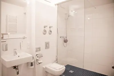 Ein Badezimmer in der Unterkunft Hotel Nikolai Residence