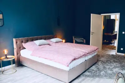 Ein Bett oder Betten in einem Zimmer der Unterkunft Villa Rumpel aus Alt mach Neu
