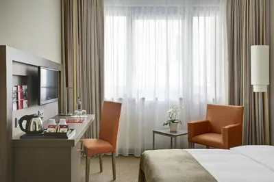 Ein Bett oder Betten in einem Zimmer der Unterkunft IntercityHotel Berlin Hauptbahnhof
