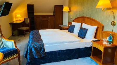 Ein Bett oder Betten in einem Zimmer der Unterkunft Residenz Seehotel Berlin Brandenburg