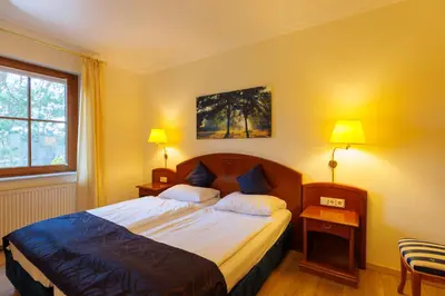 Ein Bett oder Betten in einem Zimmer der Unterkunft Residenz Seehotel Berlin Brandenburg