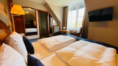 Ein Bett oder Betten in einem Zimmer der Unterkunft Residenz Seehotel Berlin Brandenburg