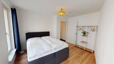 Ein Bett oder Betten in einem Zimmer der Unterkunft Travel Art Boardinghouse (Lazarettstr.)