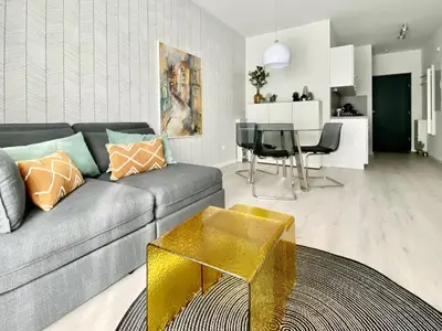 Ein Sitzbereich in der Unterkunft modernes Apartment, Terrasse und Garten am Lilienthalpark im Südwesten Berlins