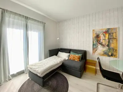 Ein Sitzbereich in der Unterkunft modernes Apartment, Terrasse und Garten am Lilienthalpark im Südwesten Berlins