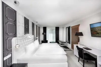 Ein Bett oder Betten in einem Zimmer der Unterkunft Hotel Linther Hof