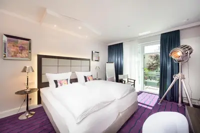 Ein Bett oder Betten in einem Zimmer der Unterkunft Hotel Linther Hof